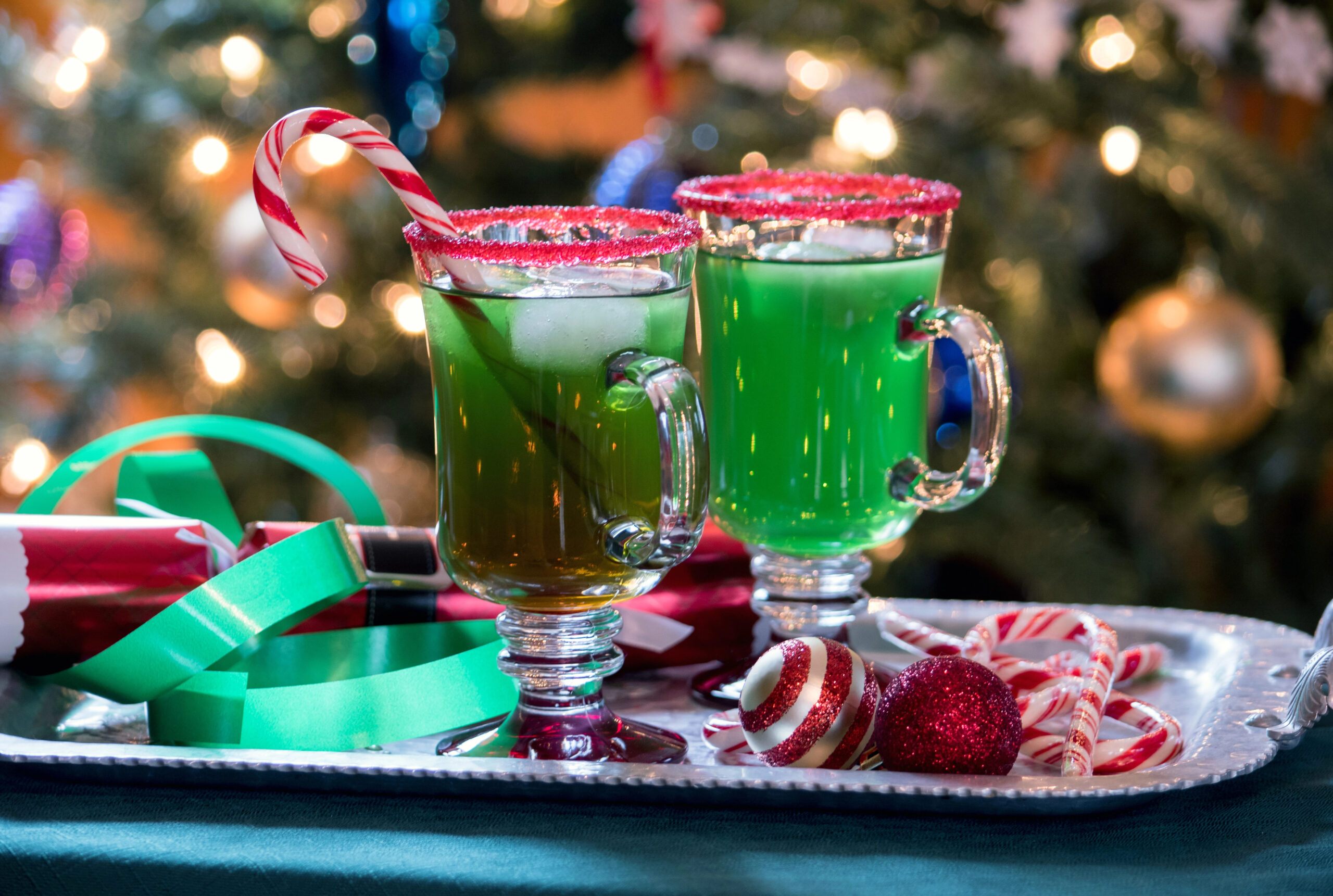 Bring Some Holiday Mischief to Your Party with a Festive Grinch Cocktail