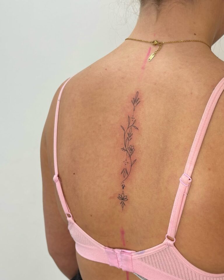 29 Stunning Spine Tattoo Ideas That Are Bold, Beautiful, and Meaningful ...