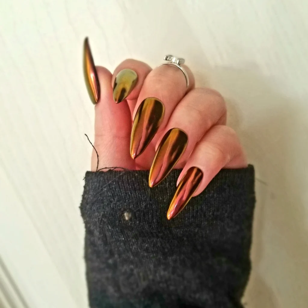 fall nails in hologram stiletto style
