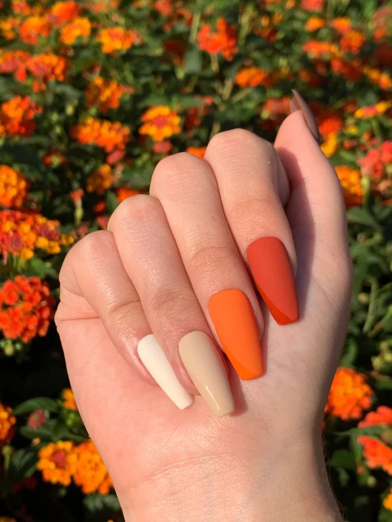 fall nails with burnt orange