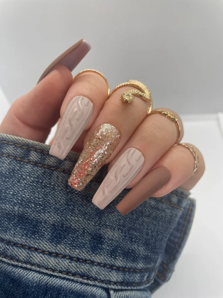 fall nails with sweater texture and bling